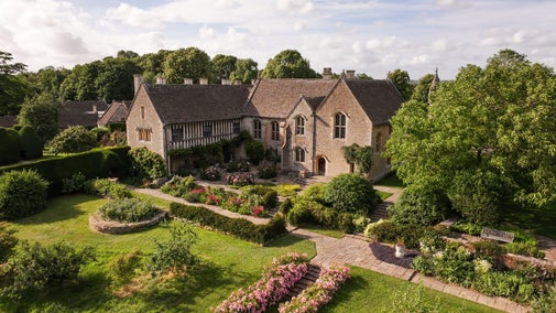 An aerial view of Great Chalfield Manor and Garden in early summer, Wiltshire